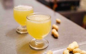 Drinking poncha at the back of a mercearia or corner store