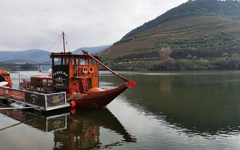 Ride a traditional rabelo boat on a Douro Valley winery tour or day trip