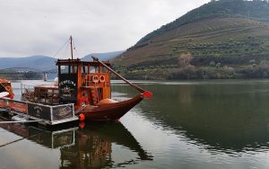 Ride a traditional rabelo boat on a Douro Valley winery tour or day trip
