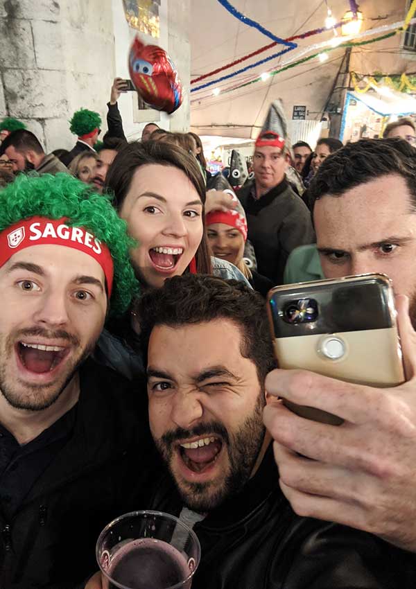 Friends at Santo Antonio festival in Alfama lisbon