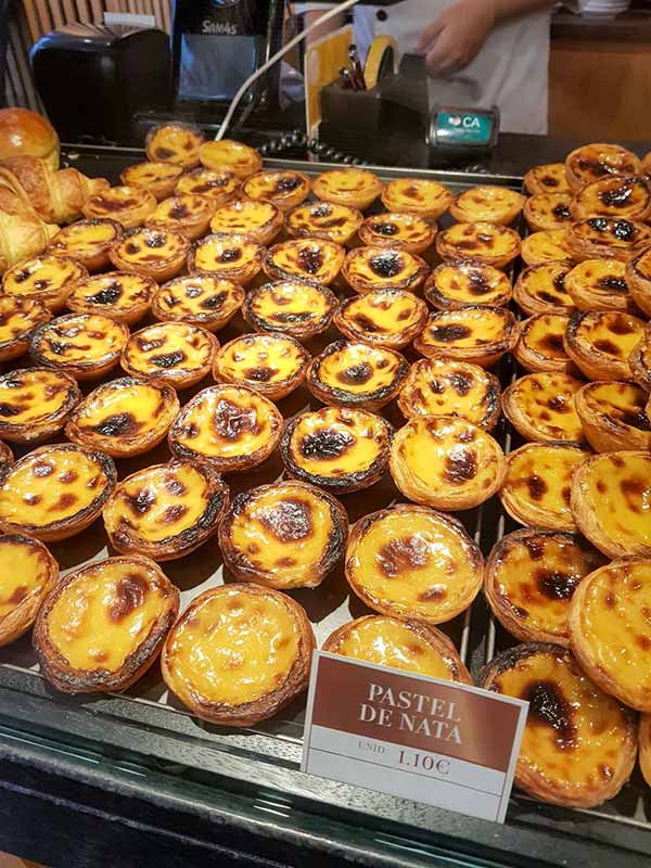 Pasteis de nata on display at Pastelaria Alcôa, Lisbon
