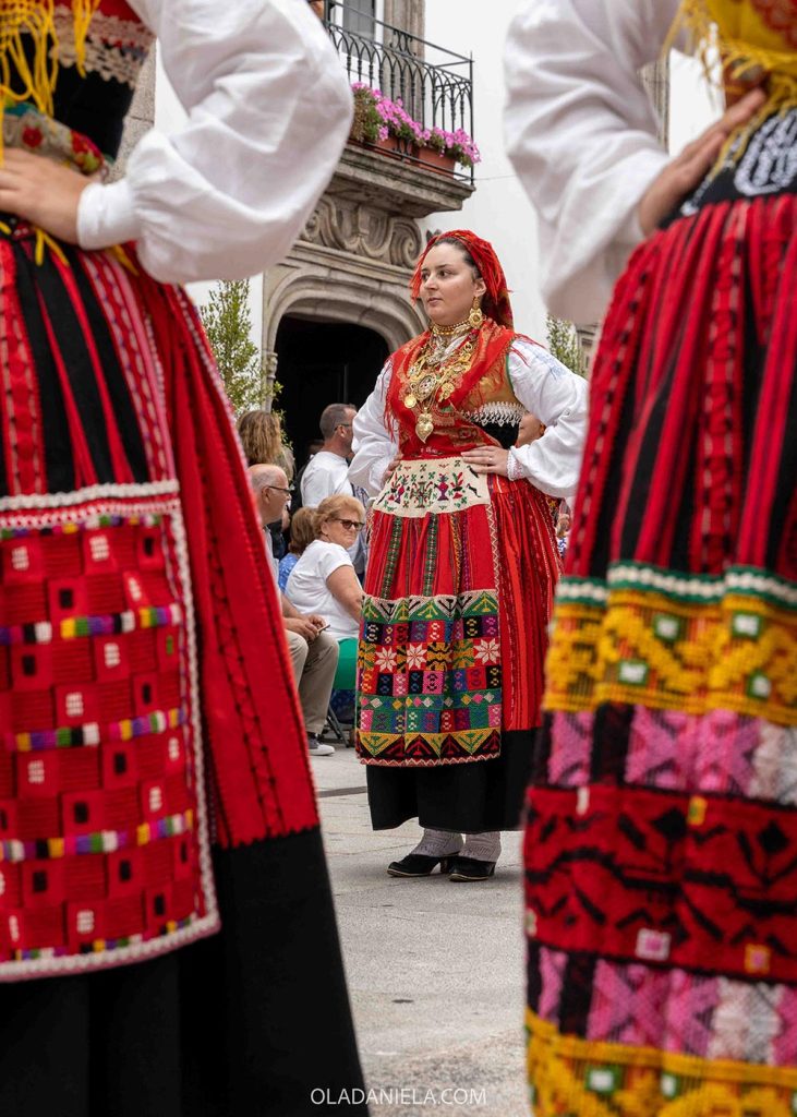 The famous red lavradeira costume at the Romaria de Nossa Senhora d’Agonia in Viana do Castelo