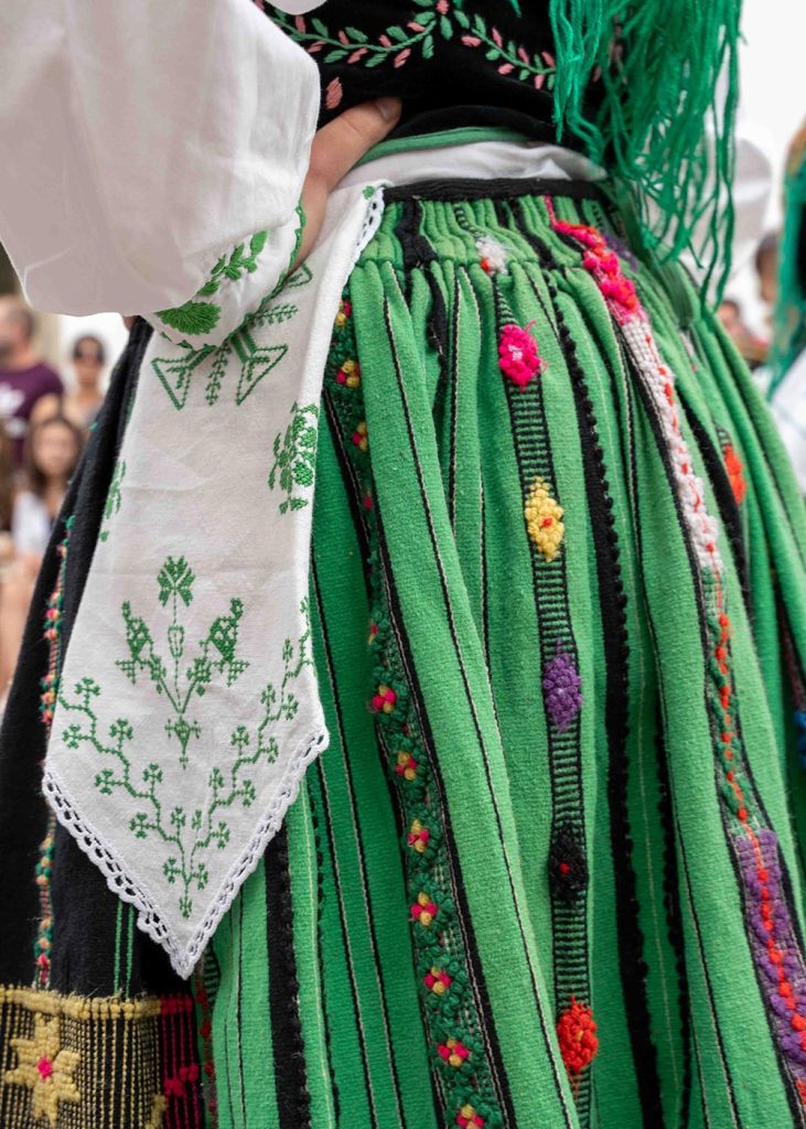 Close up of the unusual green lavradeira costume at the Romaria de Nossa Senhora d’Agonia in Viana do Castelo